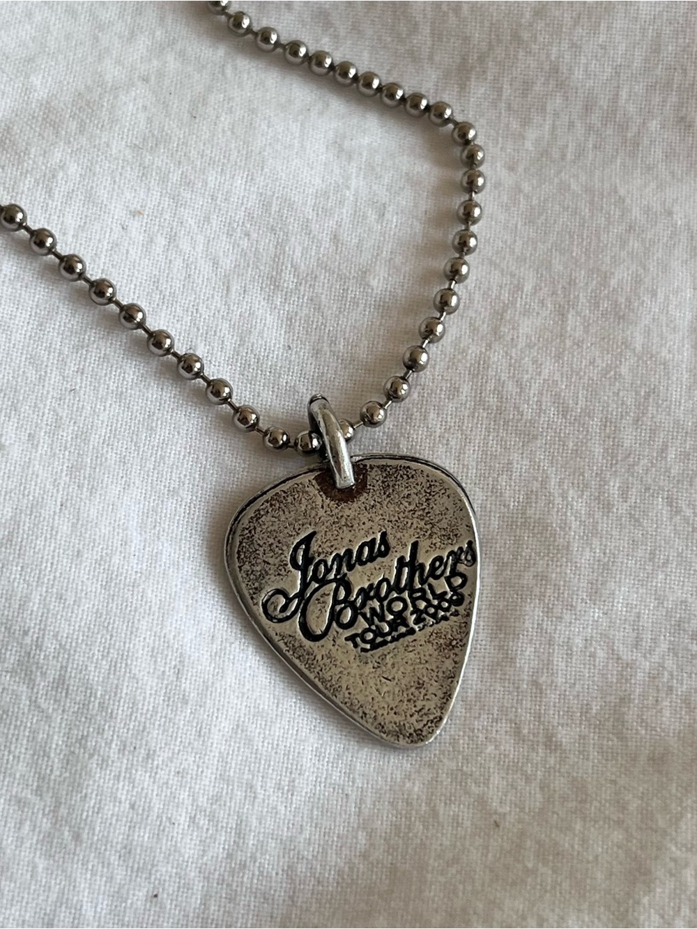 2009 Jonas Brother’s World Tour Silver Guitar Pick Pendant Necklace